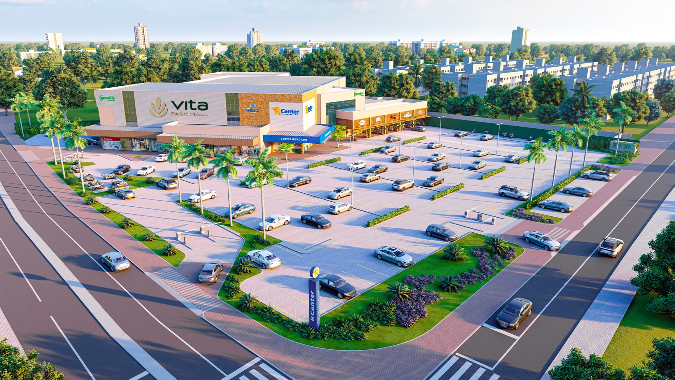 Vista aérea do Vita Park Mall com o letreiro Vita Park Mall na fachada, o R Center, a Greenlife e o estacionamento arborizado com palmeiras