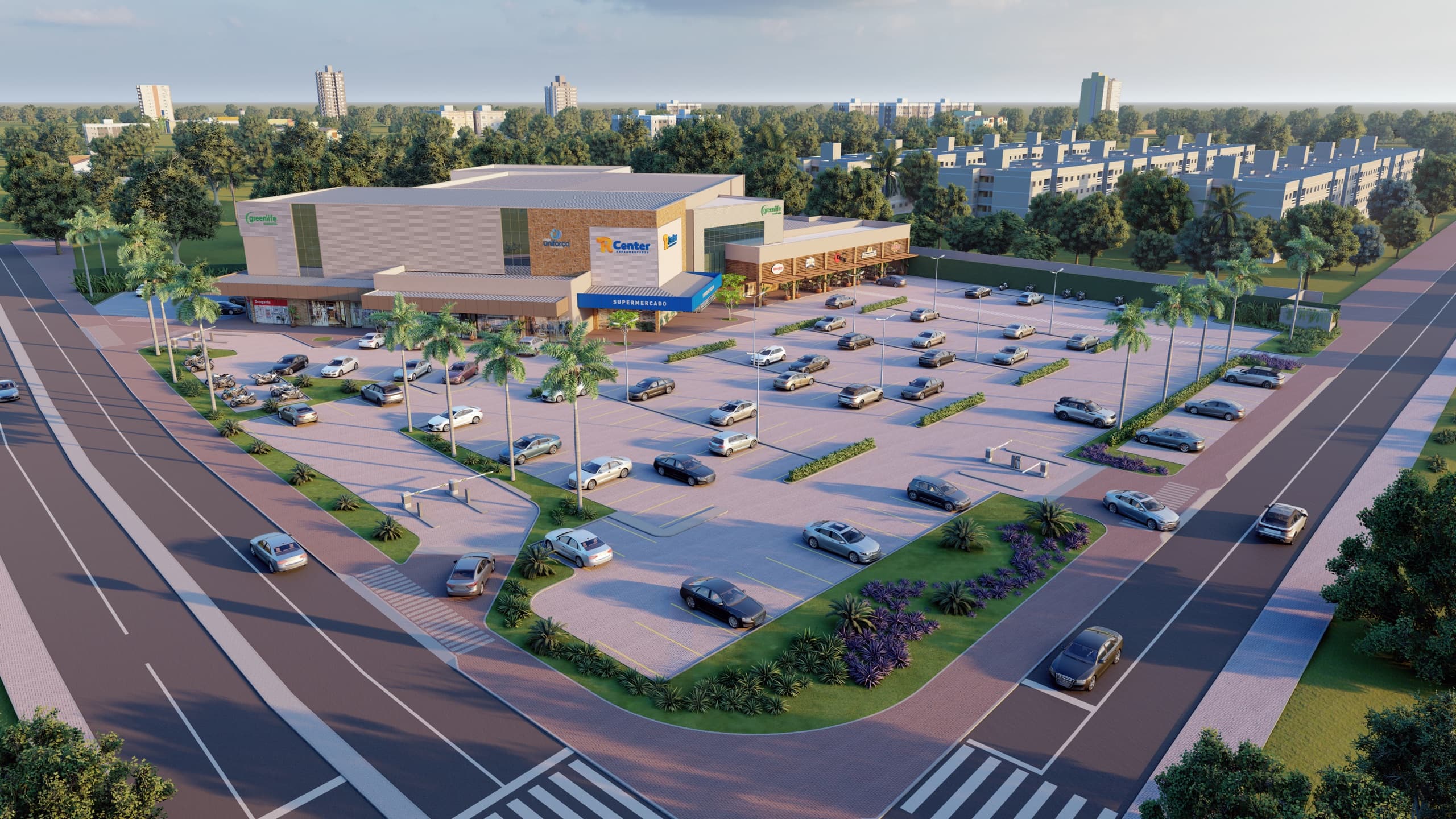 Vista aérea do estacionamento arborizado do Vita Park Mall, com a avenida ao lado